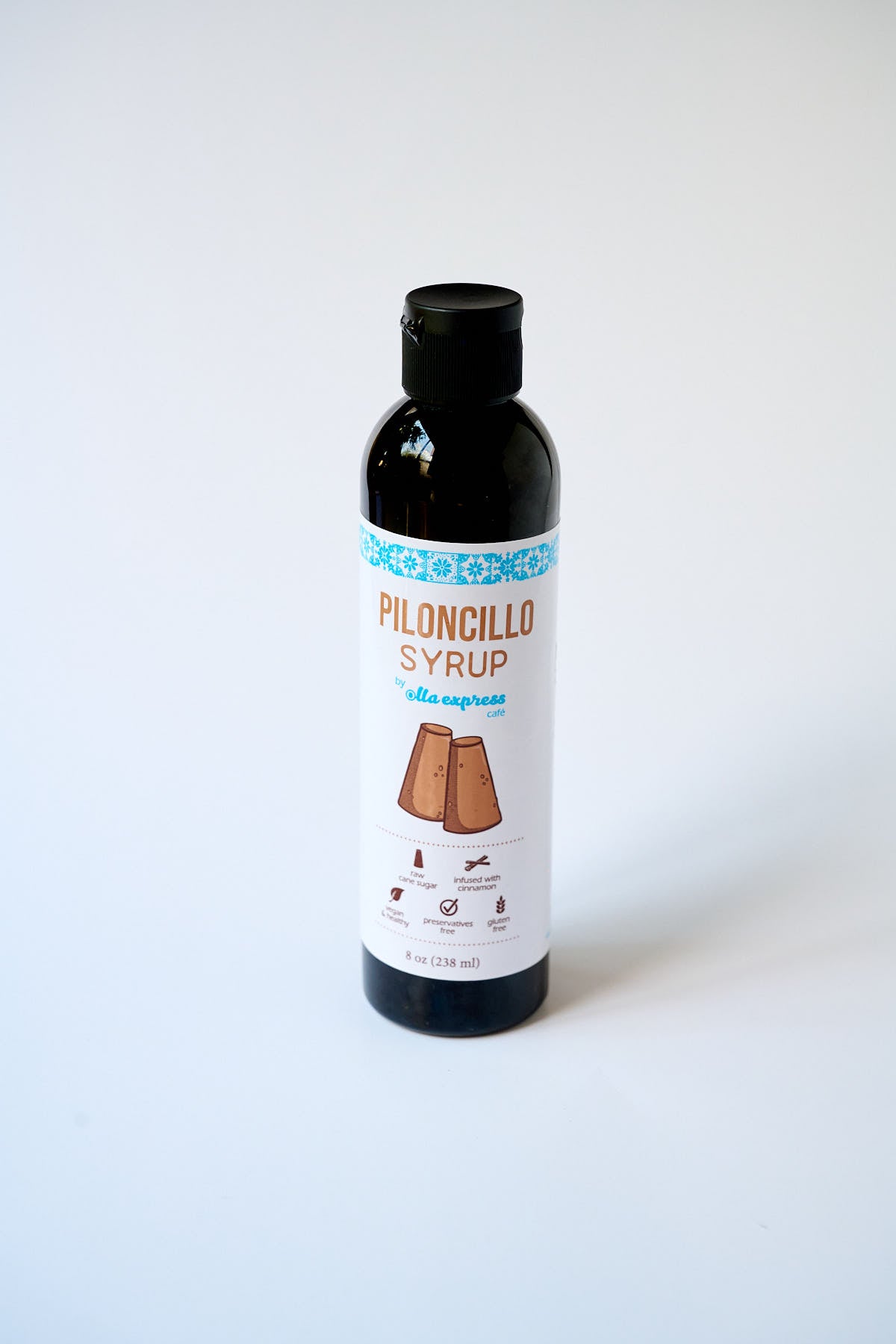 Bottle of piloncillo syrup 8 oz