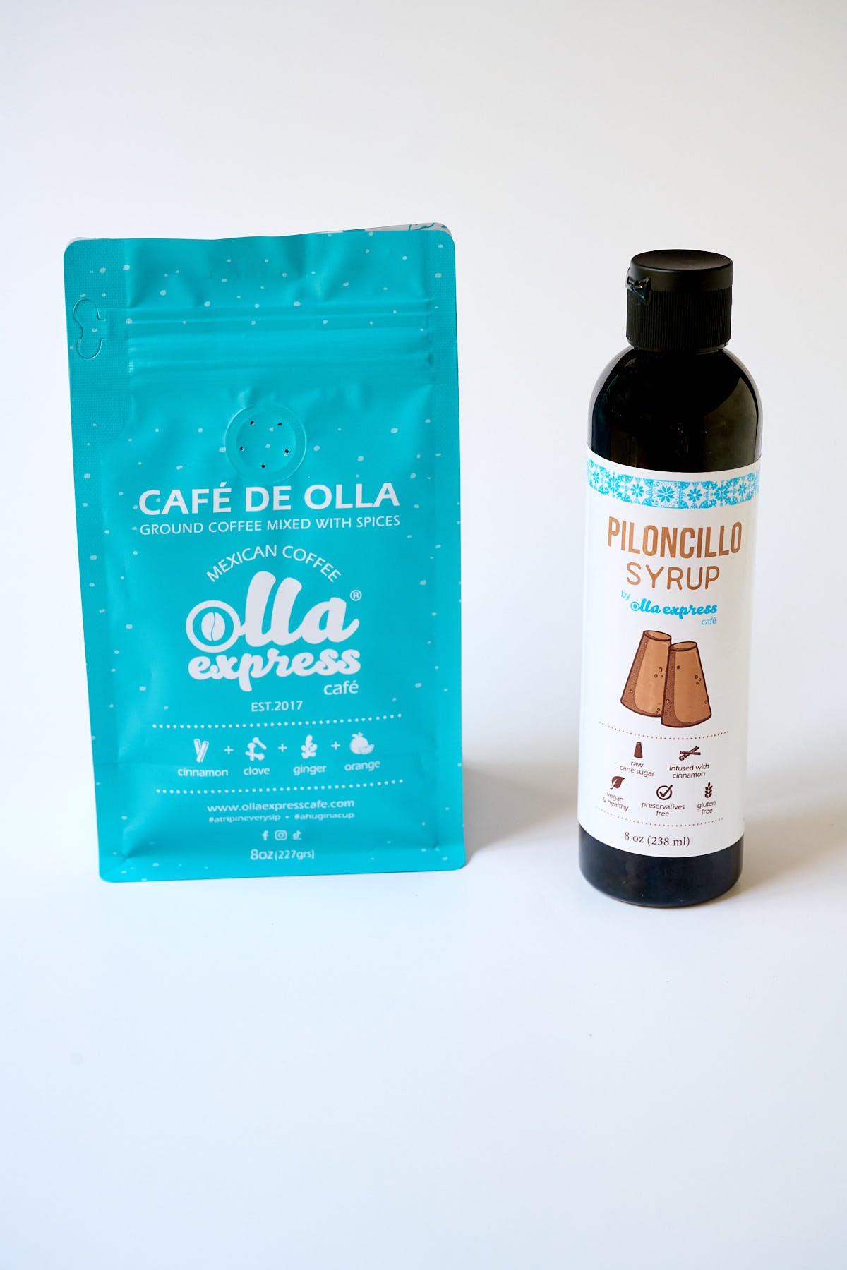 Café de Olla coffee package and Piloncillo syrup bottle on a white background